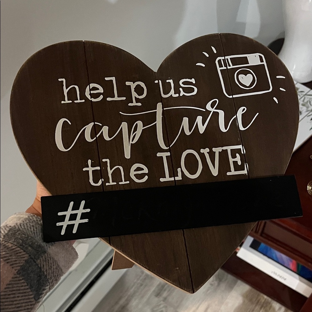 Heart-Shaped Wooden Sign with White Text